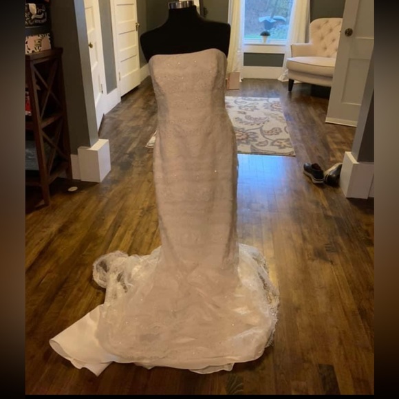Wedding dress size 10, never worn (for the big day) or altered. - Picture 6 of 7
